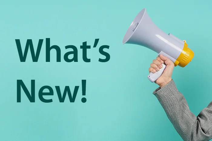 image of a megaphone and the words "what's new"