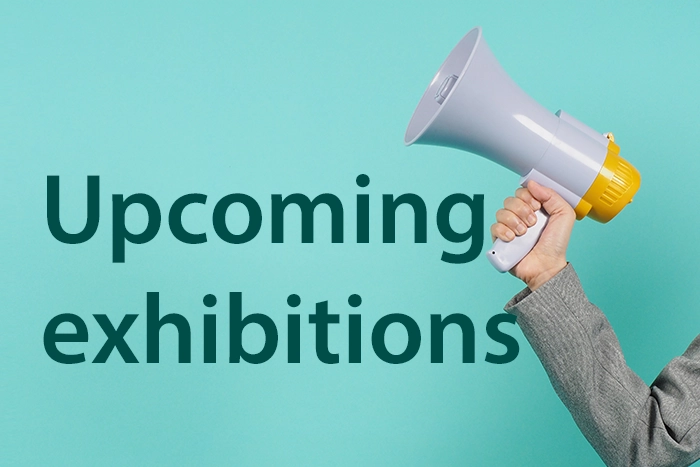 image of a megaphone and the words "next exhibitions"