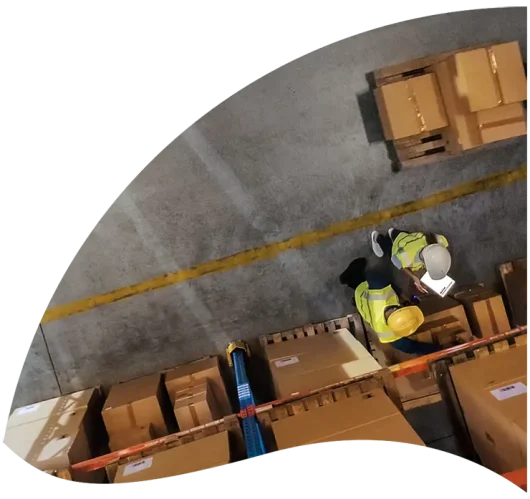 Visual of people taking inventory in a warehouse